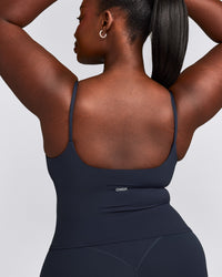 SoftMotion™ Strappy Mid Tank Top with Built in Bra Shelf with Gray Logo | True Blue
