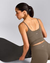 SoftMotion™ Strappy Mid Tank Top with Built in Bra Shelf with Gray Logo | Moss Brown