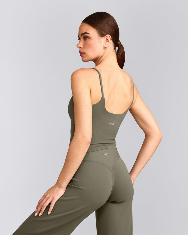 SoftMotion™ Strappy Mid Tank Top with Built in Bra Shelf with Gray Logo | Alpine Green