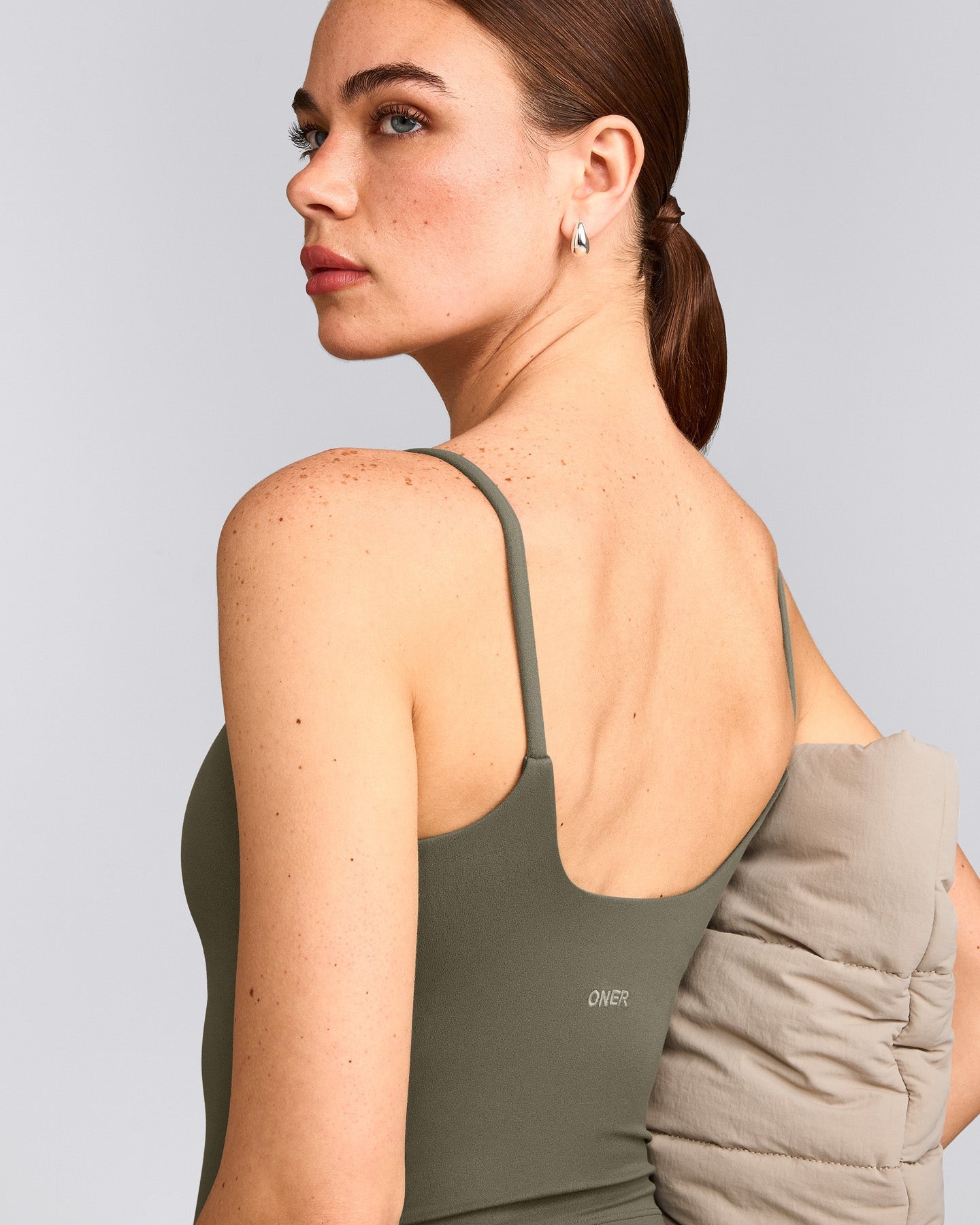 SoftMotion™ Strappy Mid Tank Top with Built in Bra Shelf with Gray Logo | Alpine Green
