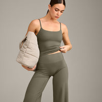 SoftMotion™ Strappy Mid Vest with Built in Bra Shelf with Gray Logo | Alpine Green