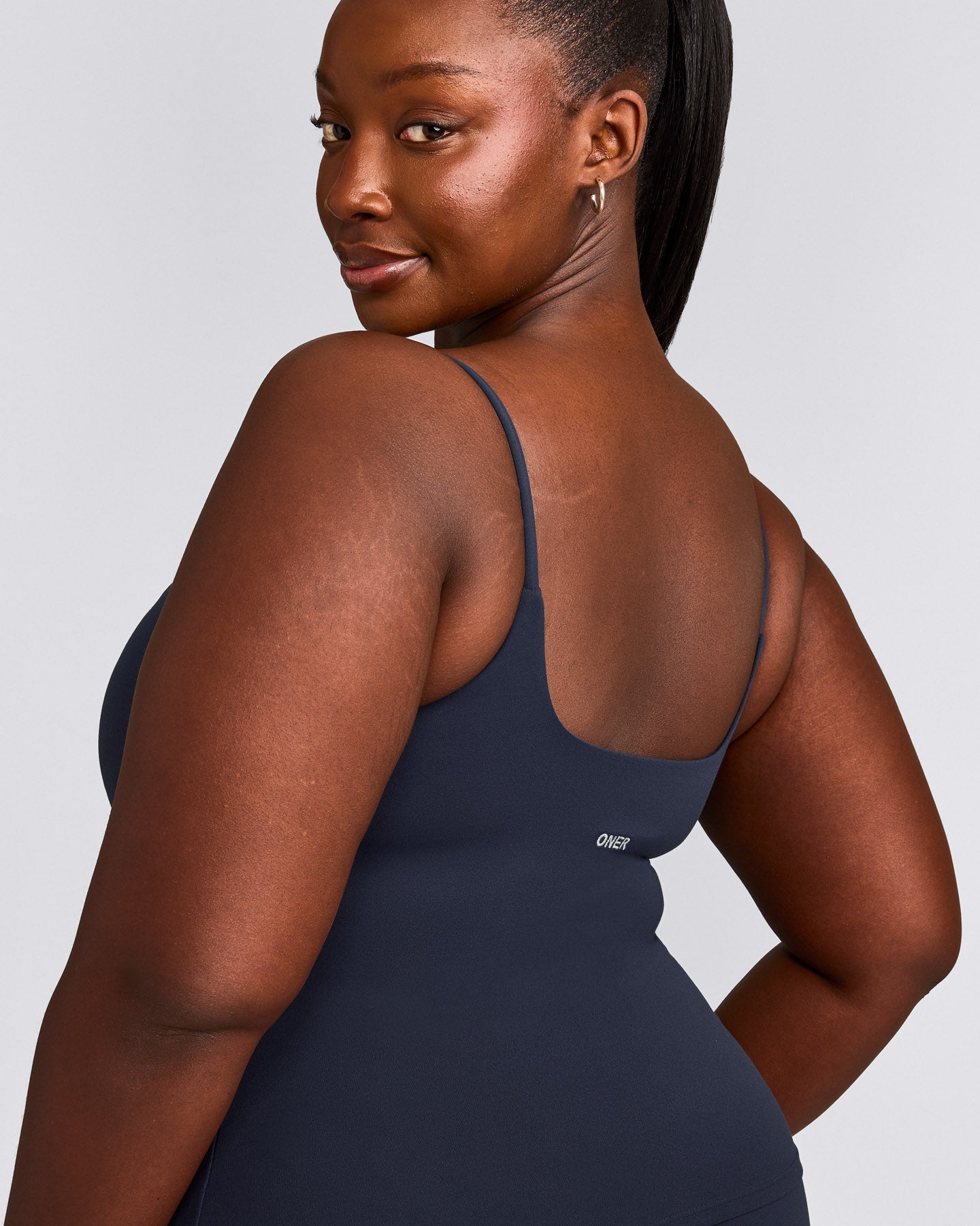SoftMotion™ Strappy Tank Top with Built in Bra Shelf with Gray Logo | True Blue