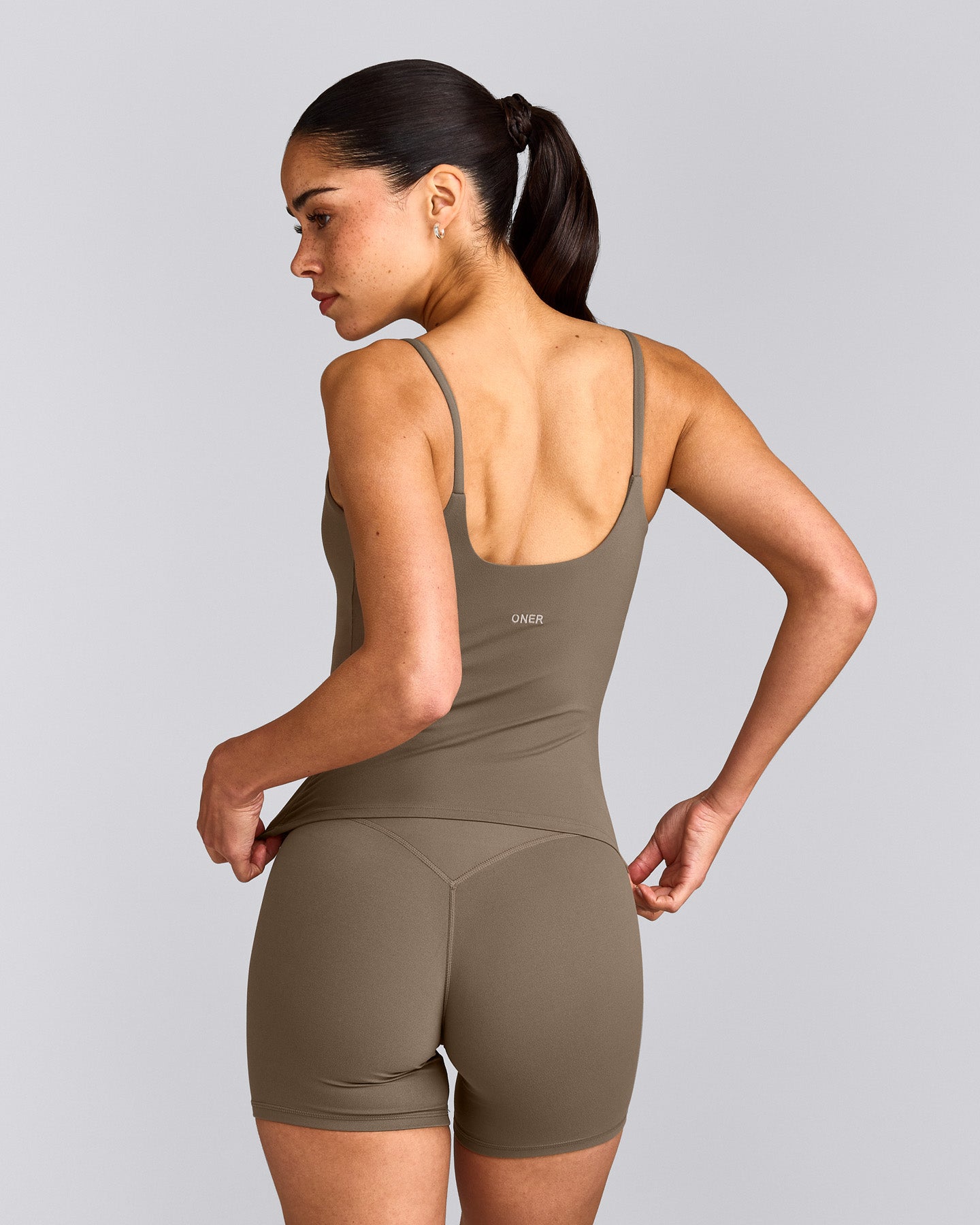 SoftMotion™ Strappy Tank Top with Built in Bra Shelf with Gray Logo | Moss Brown