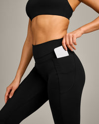 UnifiedMove High Waisted Pocket Leggings with Reflective Logo | Black