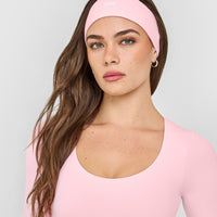 SoftMotion™ Headband with White Logo | Cherry Blossom Pink