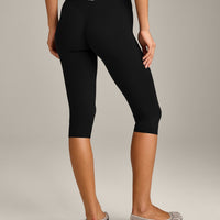 SoftMotion™ High Waisted Capri Leggings with Gray Logo | Black