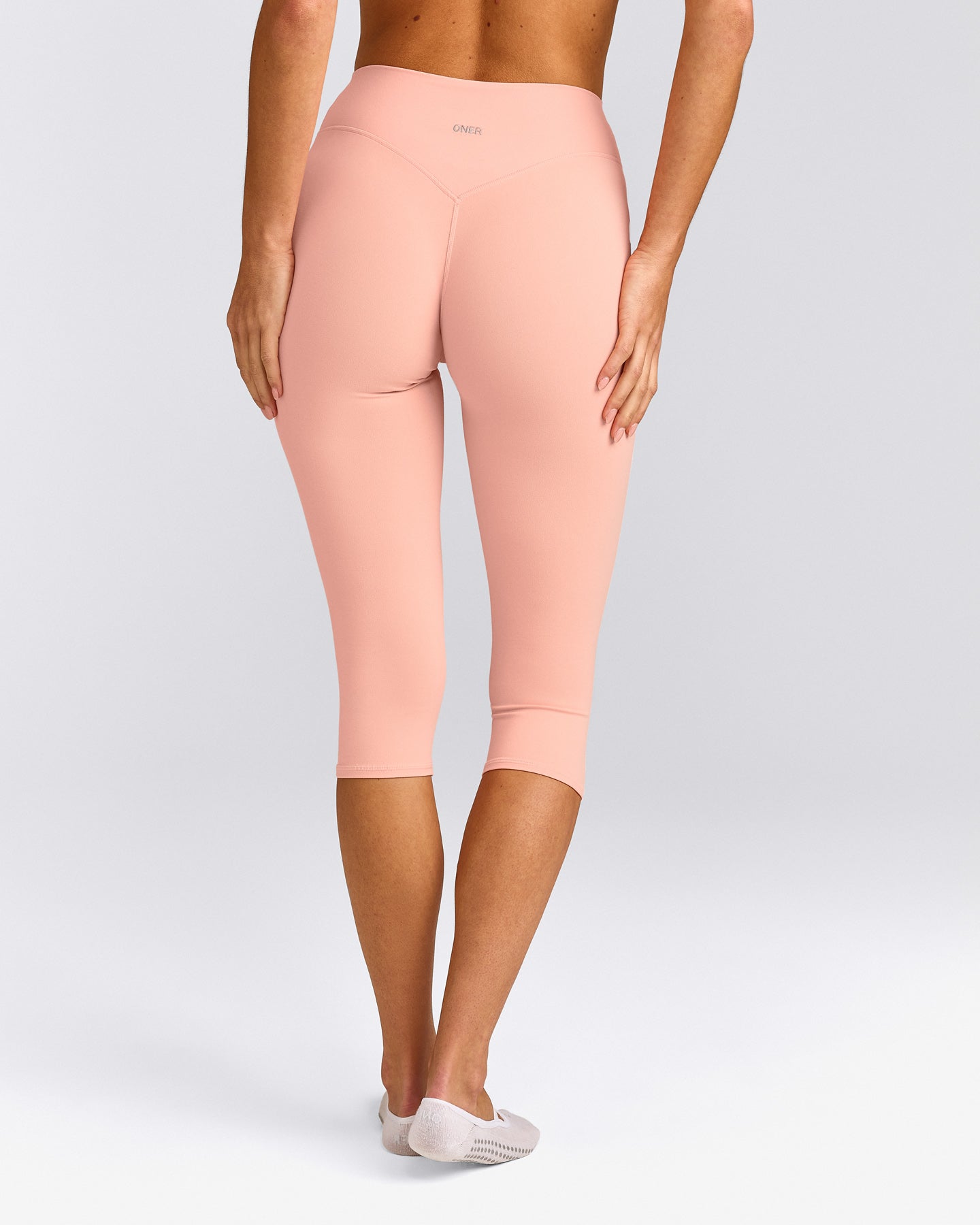 SoftMotion™ High Waisted Capri Leggings with Gray Logo | Peach Orange