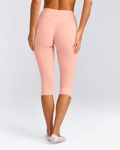 SoftMotion™ High Waisted Capri Leggings with Gray Logo | Peach Orange