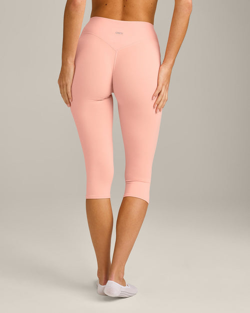 SoftMotion™ High Waisted Capri Leggings with Gray Logo | Peach Orange