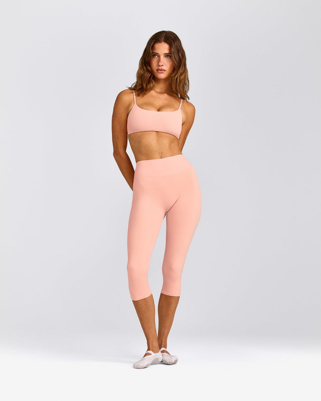 SoftMotion™ High Waisted Capri Leggings with Gray Logo | Peach Orange
