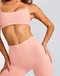 SoftMotion™ High Waisted Capri Leggings with Gray Logo | Peach Orange