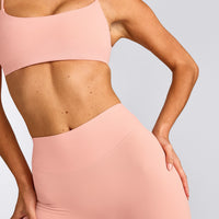 SoftMotion™ High Waisted Capri Leggings with Gray Logo | Peach Orange
