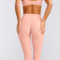 SoftMotion™ High Waisted Capri Leggings with Gray Logo | Peach Orange