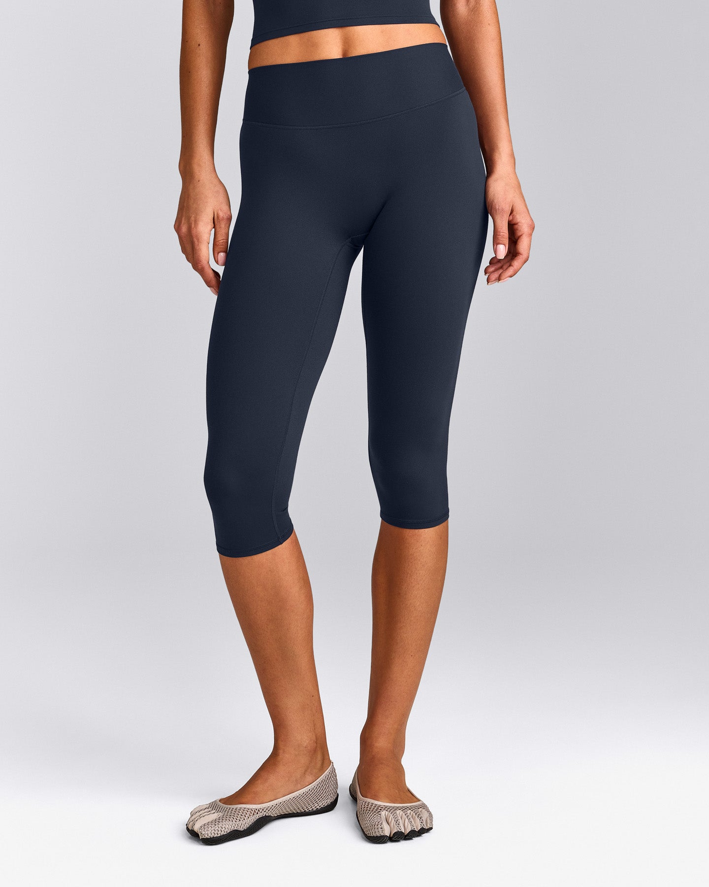 SoftMotion™ High Waisted Capri Leggings with Gray Logo | True Blue