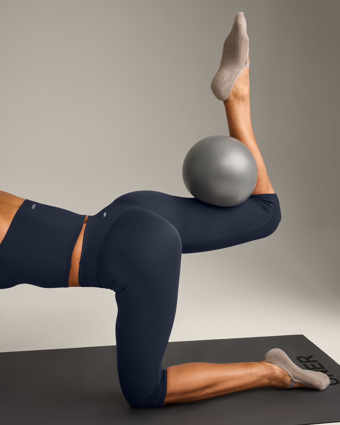 SoftMotion™ High Waisted Capri Leggings with Gray Logo | True Blue