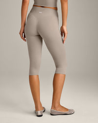 SoftMotion™ High Waisted Capri Leggings with White Logo | Warm Sand