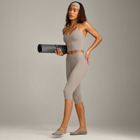 SoftMotion™ High Waisted Capri Leggings with White Logo | Warm Sand