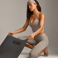 SoftMotion™ High Waisted Capri Leggings with White Logo | Warm Sand