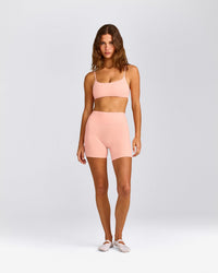 SoftMotion™ High Waisted Shorts 6" with Gray Logo | Peach Orange