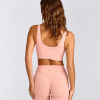 SoftMotion™ Longline Sports Bra with Gray Logo | Peach Orange