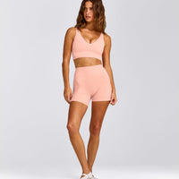 SoftMotion™ Longline Sports Bra with Gray Logo | Peach Orange