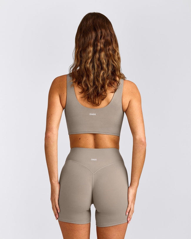 SoftMotion™ Longline Sports Bra with White Logo | Warm Sand