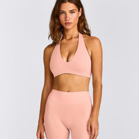 SoftMotion™ Minimal Halter Neck Bralette with Gray Logo | Peach Orange