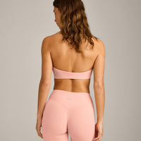SoftMotion™ Minimal Halter Neck Bralette with Gray Logo | Peach Orange