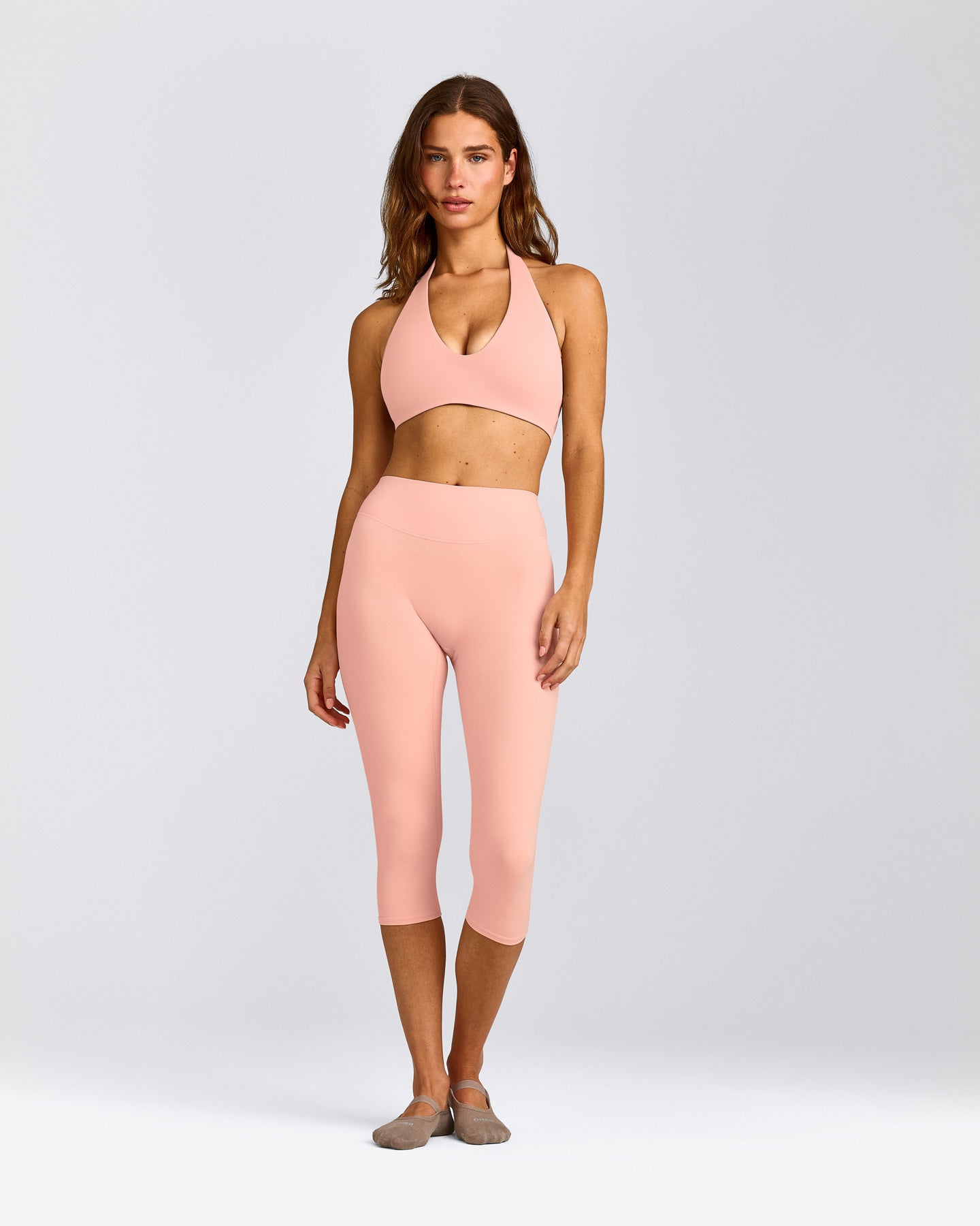 SoftMotion™ Minimal Halter Neck Bralette with Gray Logo | Peach Orange