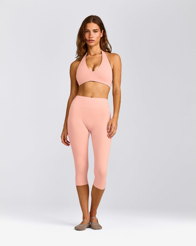 SoftMotion™ Minimal Halter Neck Bralette with Gray Logo | Peach Orange