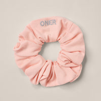 SoftMotion™ Scrunchie with Gray Logo | Peach Orange