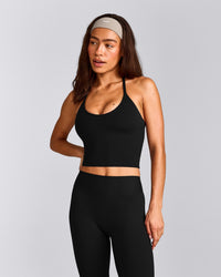 SoftMotion™ Strappy Halter Neck Mid Tank Top with Built in Bra Shelf with Gray Logo | Black