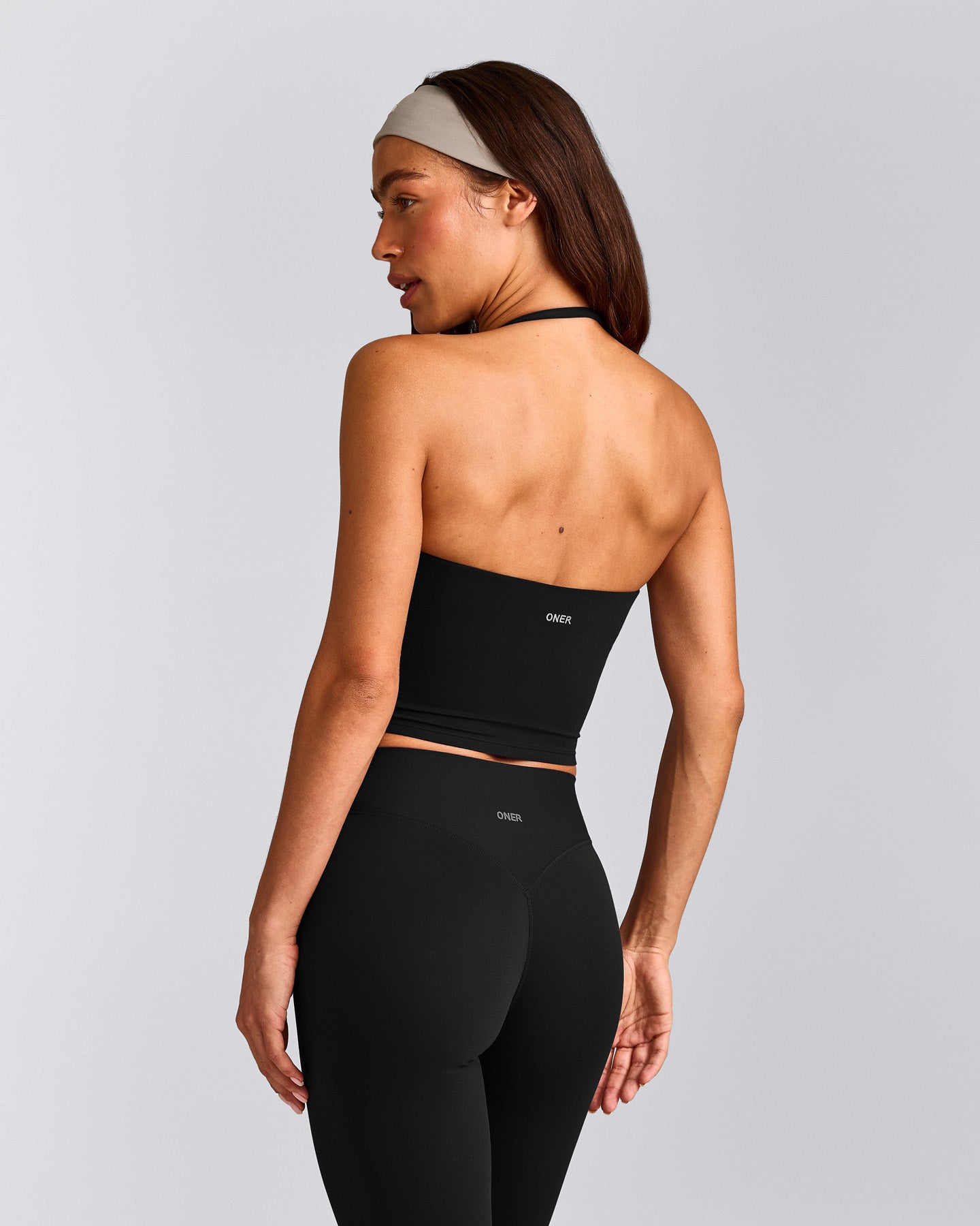 SoftMotion™ Strappy Halter Neck Mid Tank Top with Built in Bra Shelf with Gray Logo | Black