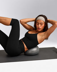 SoftMotion™ Strappy Halter Neck Mid Tank Top with Built in Bra Shelf with Gray Logo | Black