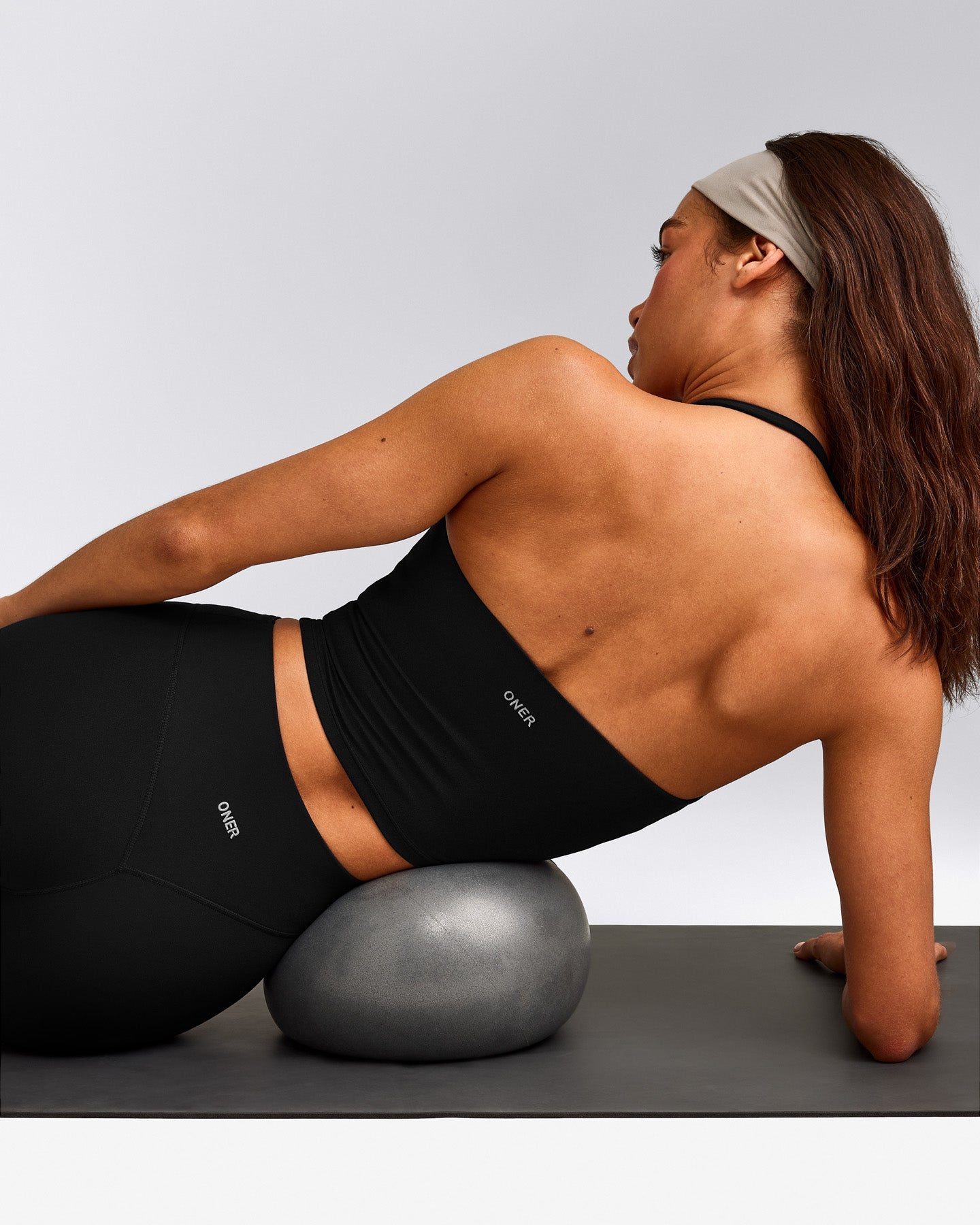 SoftMotion™ Strappy Halter Neck Mid Tank Top with Built in Bra Shelf with Gray Logo | Black