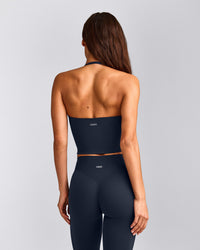 SoftMotion™ Strappy Halter Neck Mid Tank Top with Built in Bra Shelf with Gray Logo | True Blue