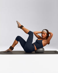 SoftMotion™ Strappy Halter Neck Mid Tank Top with Built in Bra Shelf with Gray Logo | True Blue