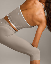 SoftMotion™ Strappy Halter Neck Mid Tank Top with Built in Bra Shelf with White Logo | Warm Sand