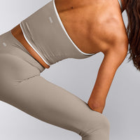 SoftMotion™ Strappy Halter Neck Mid Tank Top with Built in Bra Shelf with White Logo | Warm Sand