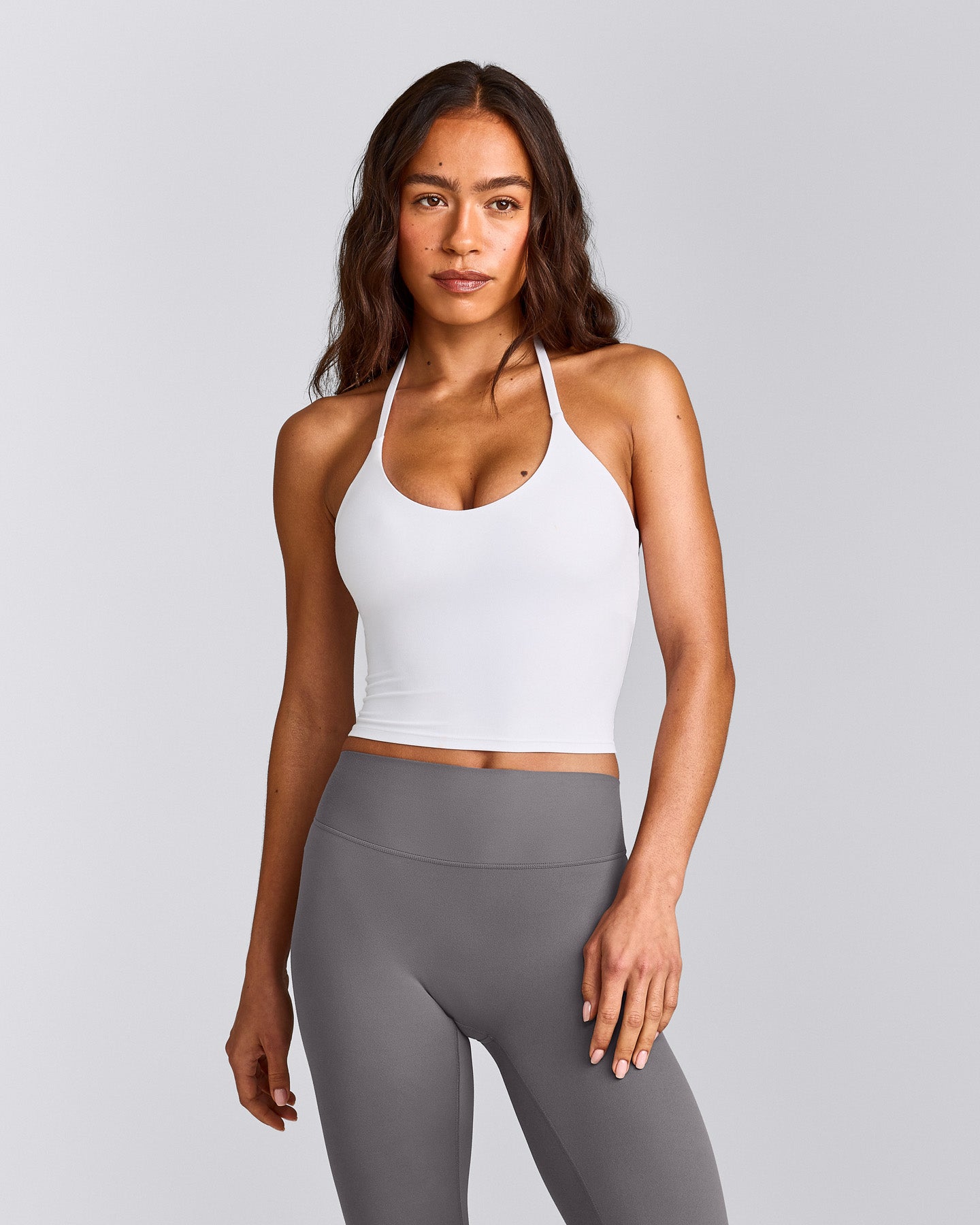 SoftMotion™ Strappy Halter Neck Mid Tank Top with Built in Bra Shelf with Gray Logo | White