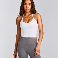 SoftMotion™ Strappy Halter Neck Mid Tank Top with Built in Bra Shelf with Gray Logo | White