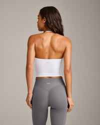 SoftMotion™ Strappy Halter Neck Mid Tank Top with Built in Bra Shelf with Gray Logo | White