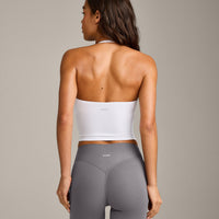 SoftMotion™ Strappy Halter Neck Mid Tank Top with Built in Bra Shelf with Gray Logo | White
