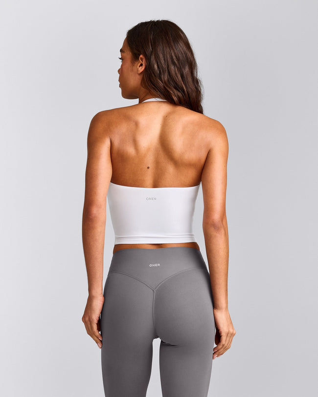 SoftMotion™ Strappy Halter Neck Mid Tank Top with Built in Bra Shelf with Gray Logo | White