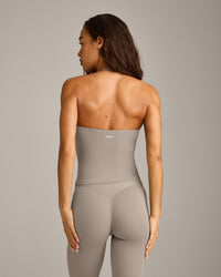 SoftMotion™ Strappy Halter Neck Tank Top with Built in Bra Shelf with White Logo | Warm Sand