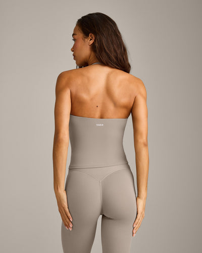 SoftMotion™ Strappy Halter Neck Tank Top with Built in Bra Shelf with White Logo | Warm Sand