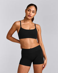 SoftMotion™ Strappy Sports Bra with Gray Logo | Black