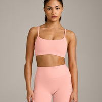 SoftMotion™ Strappy Sports Bra with Gray Logo | Peach Orange