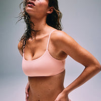 SoftMotion™ Strappy Sports Bra with Gray Logo | Peach Orange