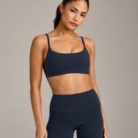 SoftMotion™ Strappy Sports Bra with Gray Logo | True Blue
